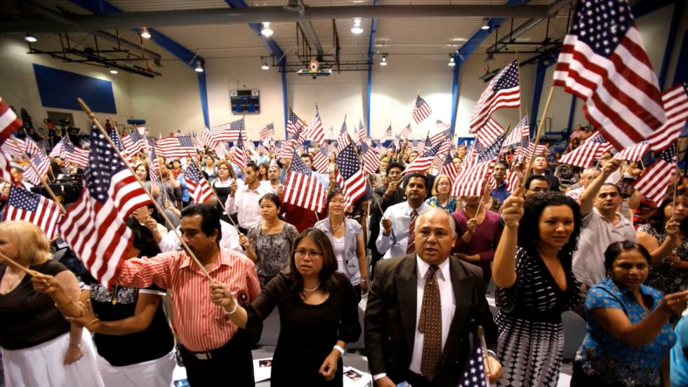 Read more about the article ICE Raids Threaten to Overshadow Major US Citizenship Ceremony. By Katy Moore.